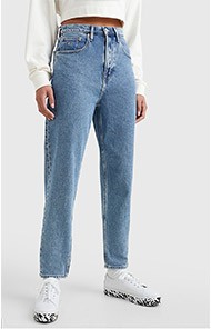 Person wearing high-waisted straight-leg blue jeans