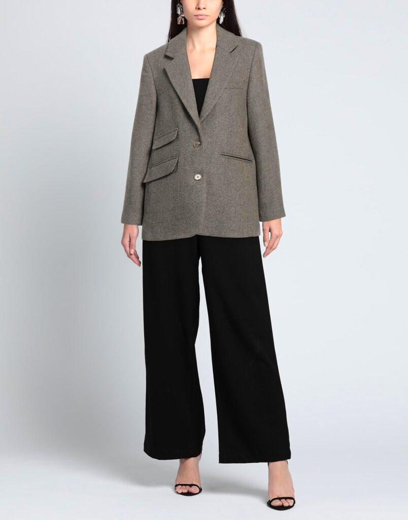 Woman wearing gray blazer and black wide-leg pants