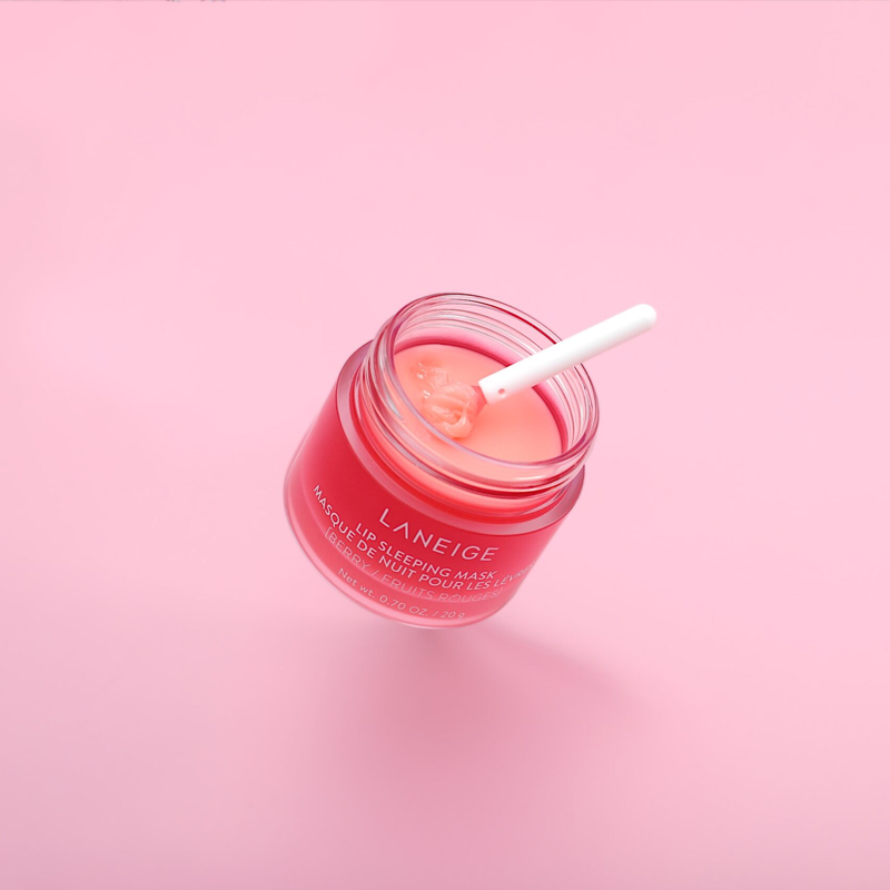 Opened pink lip sleeping mask with spoon