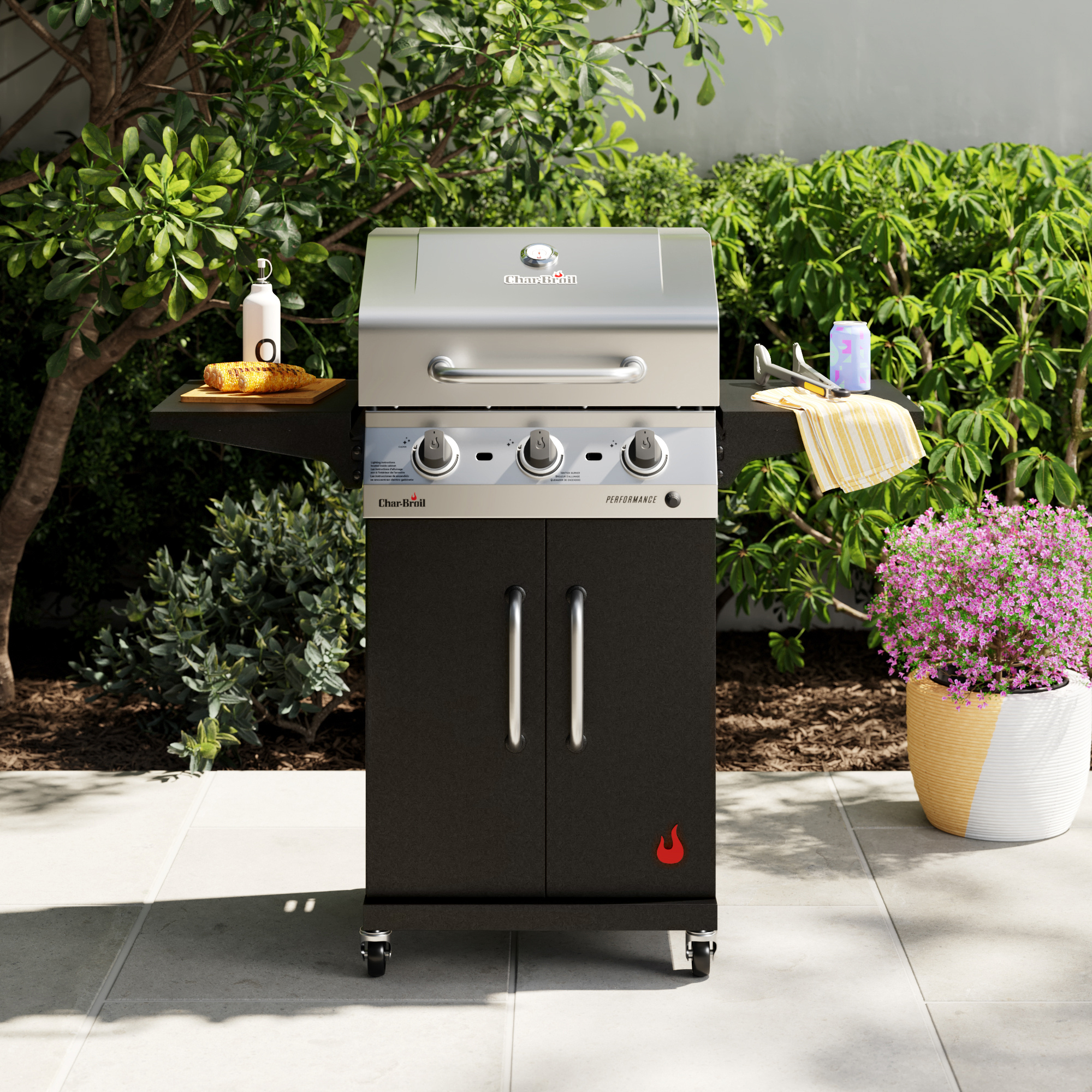 Char-Broil gas grill with corn and drink outdoors