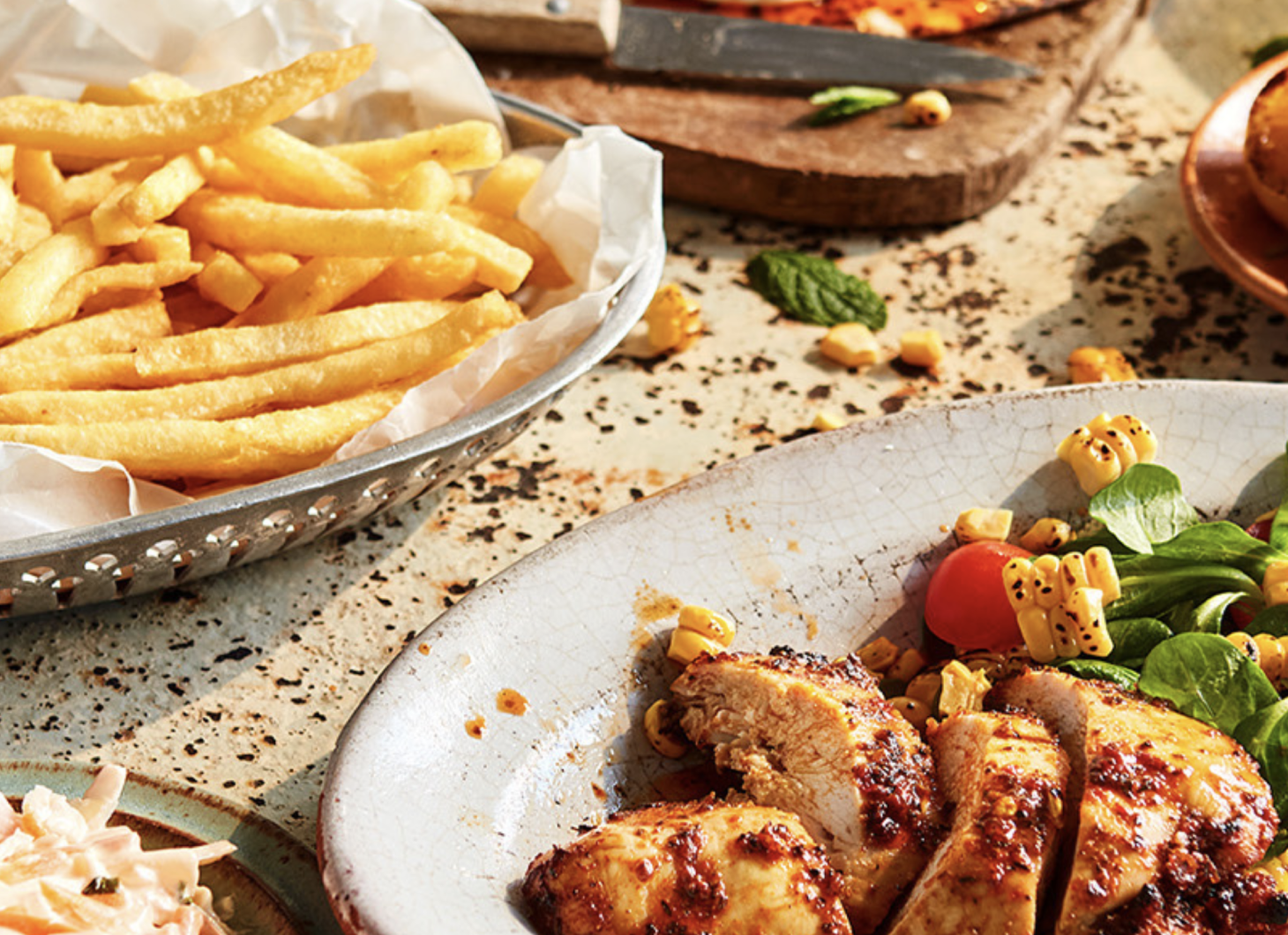 Grilled chicken with salad and French fries