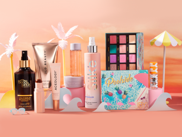 Assorted beauty products with summer-themed decorations