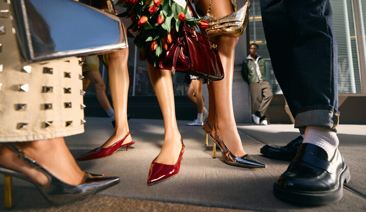 Stylish shoes and handbags on city sidewalk