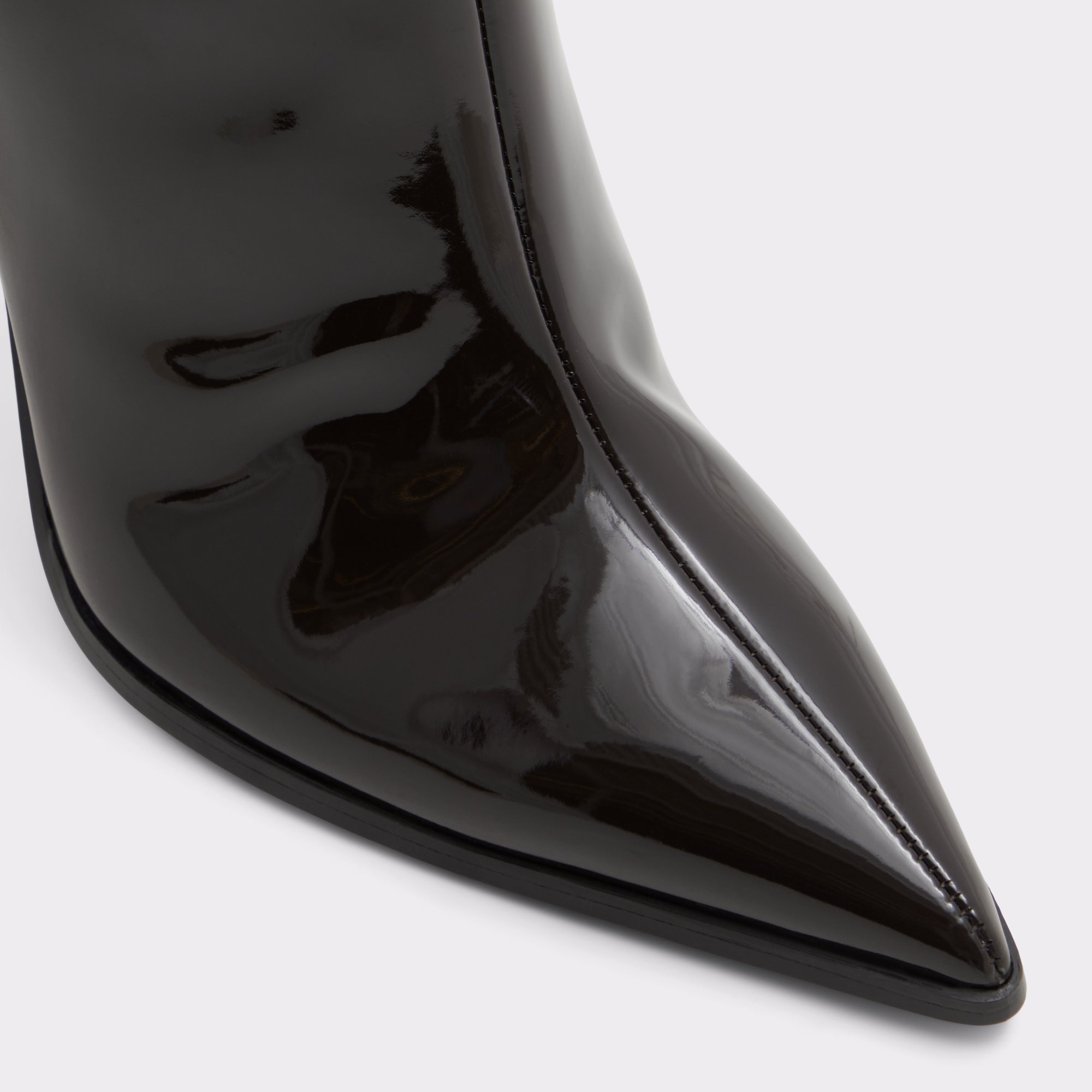 maybellie-wc_brown_201-002-033_alt4_sq_gy_2000x2000 Glossy black pointed toe boot close-up