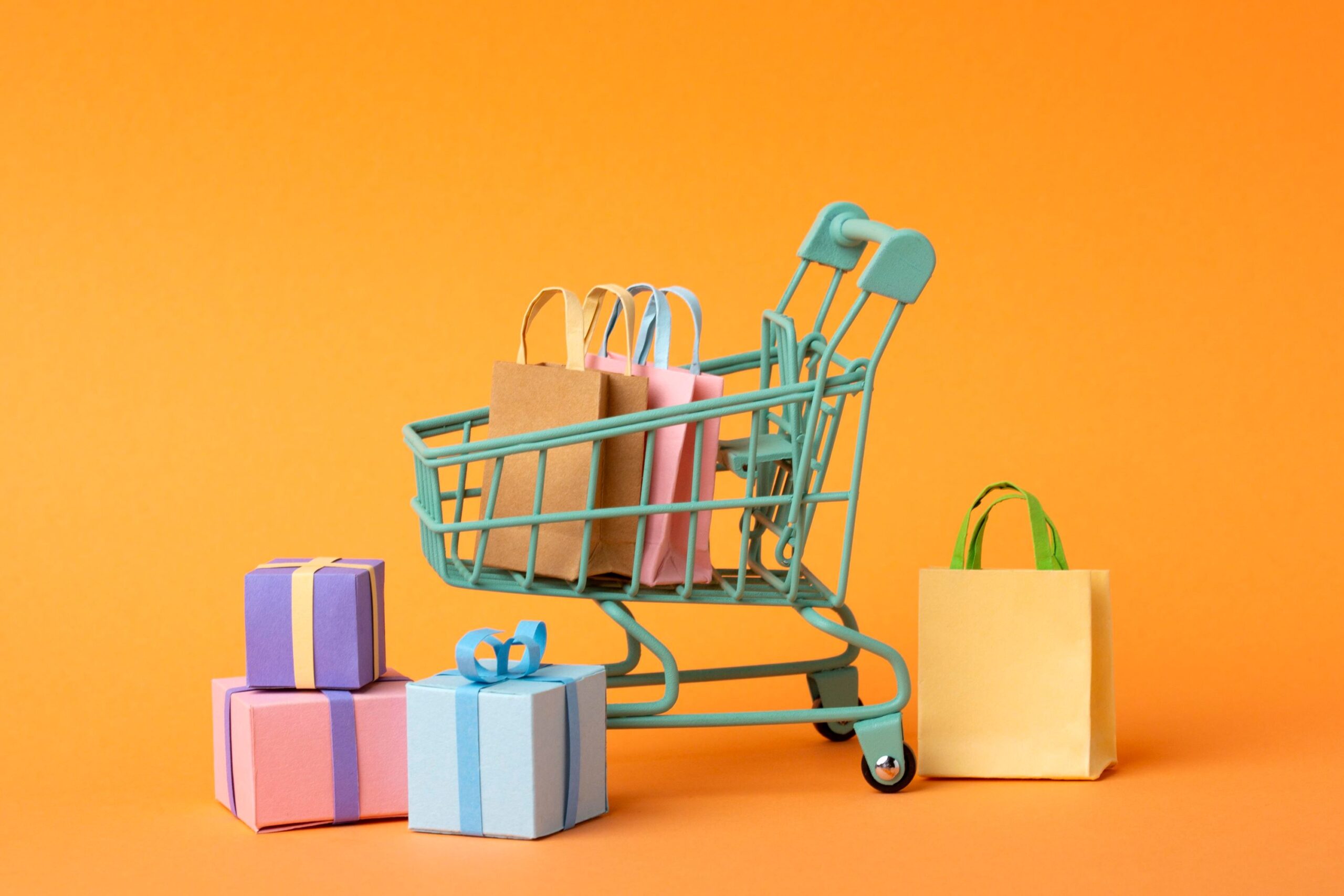 Shopping cart with bags and gift boxes