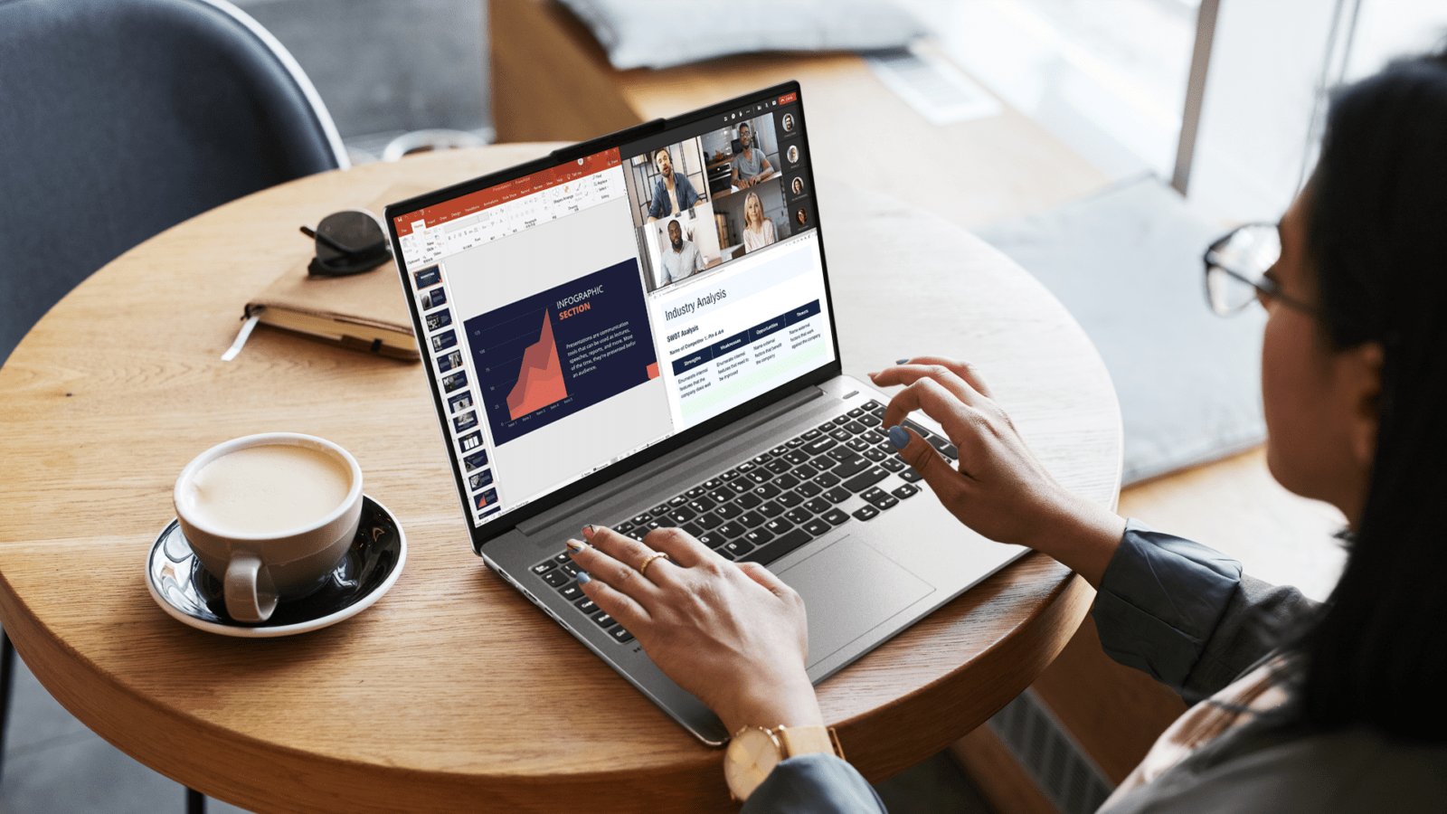 Person working on laptop during virtual business meeting
