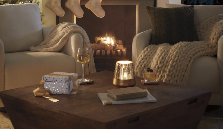 Cozy Christmas living room with fireplace and stockings