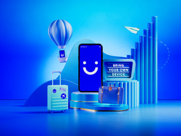 Blue travel-themed tech setup with smartphone and luggage