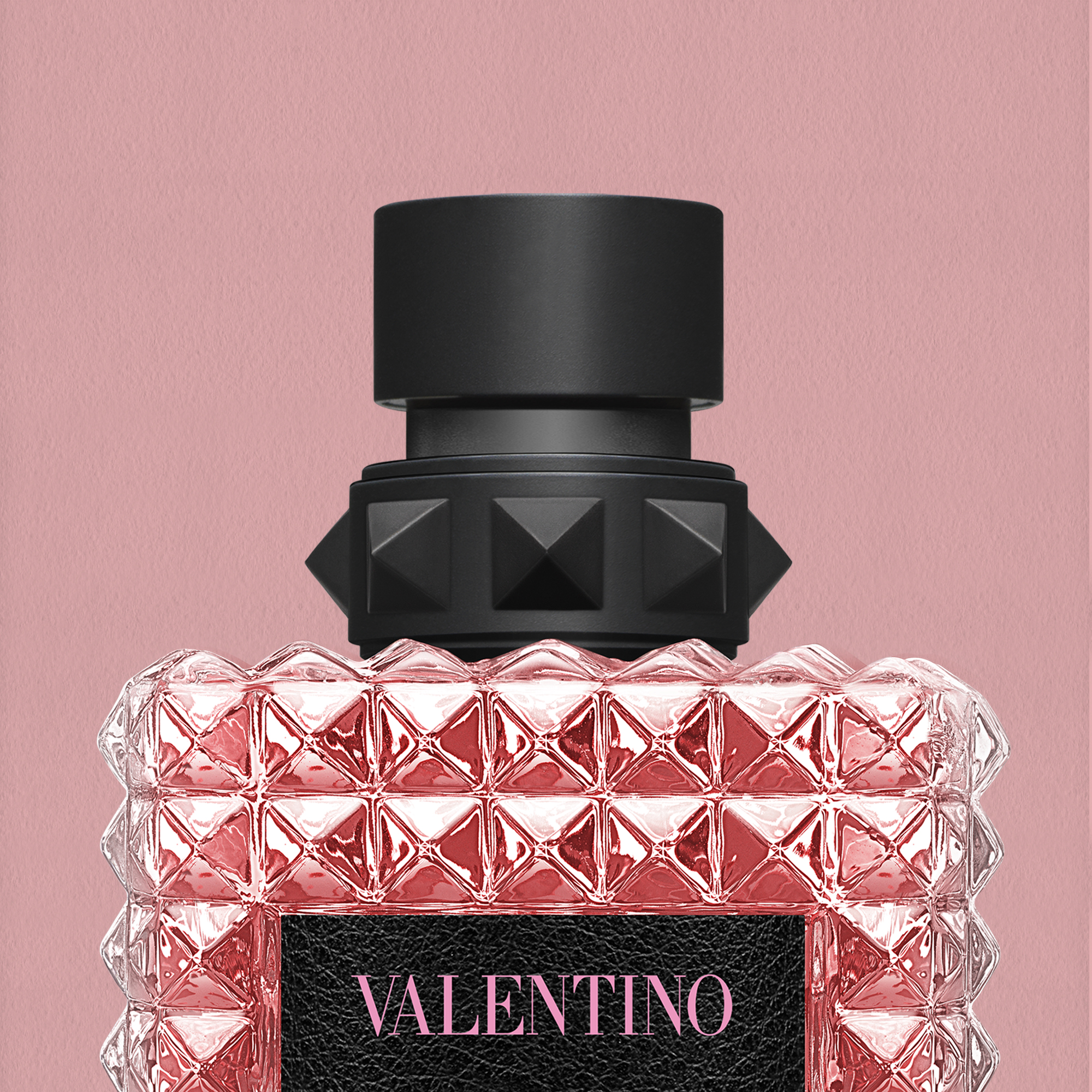 Pink Valentino perfume bottle with studded glass design