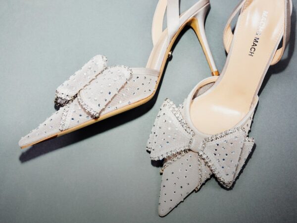 Elegant high-heeled shoes with embellished bows