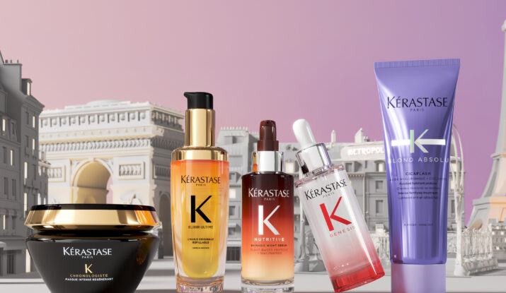 Five Kérastase hair care products with Parisian backdrop
