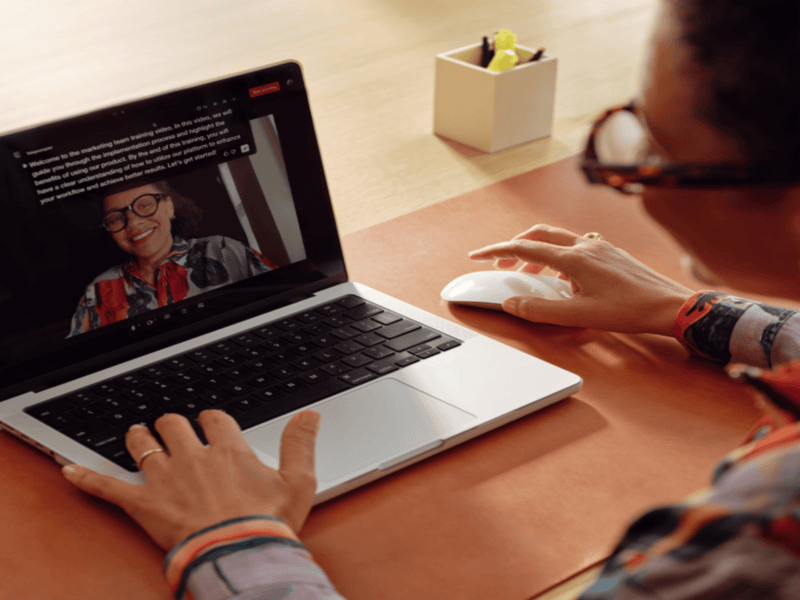 Person attending virtual meeting on laptop
