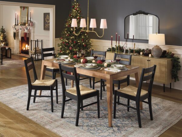 Christmas dining room with decorated table and tree