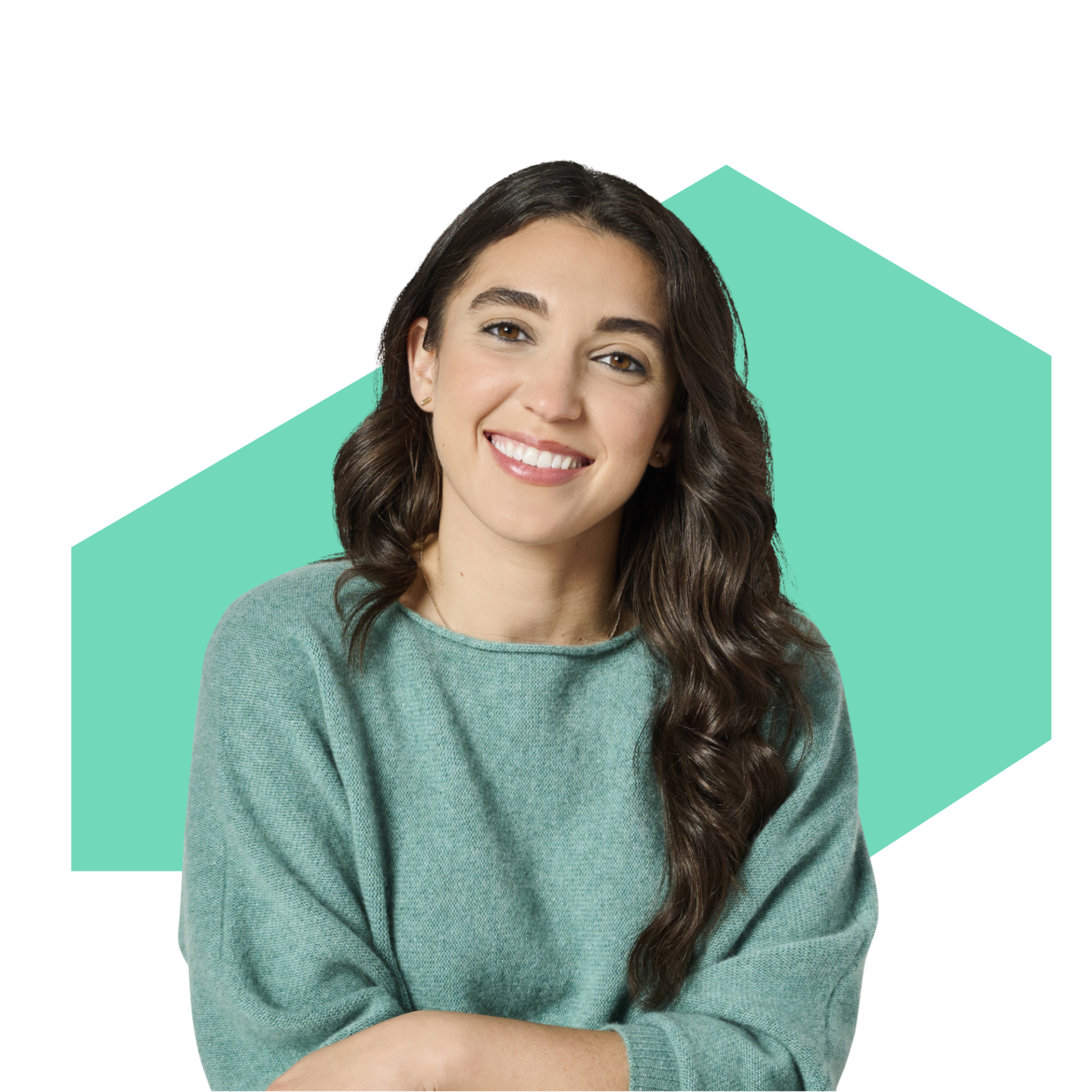Smiling woman with wavy hair wearing green sweater