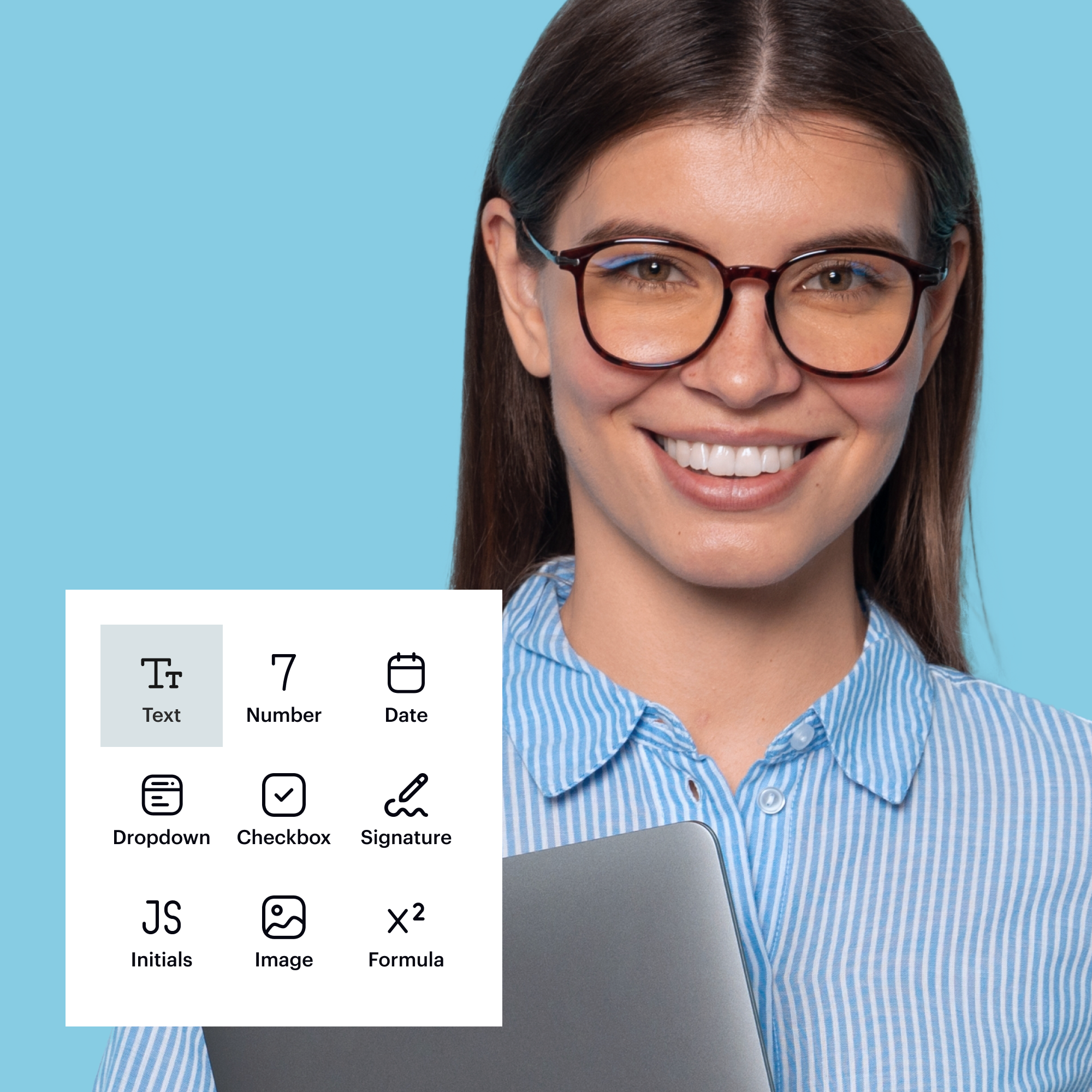 Smiling woman with glasses holding laptop