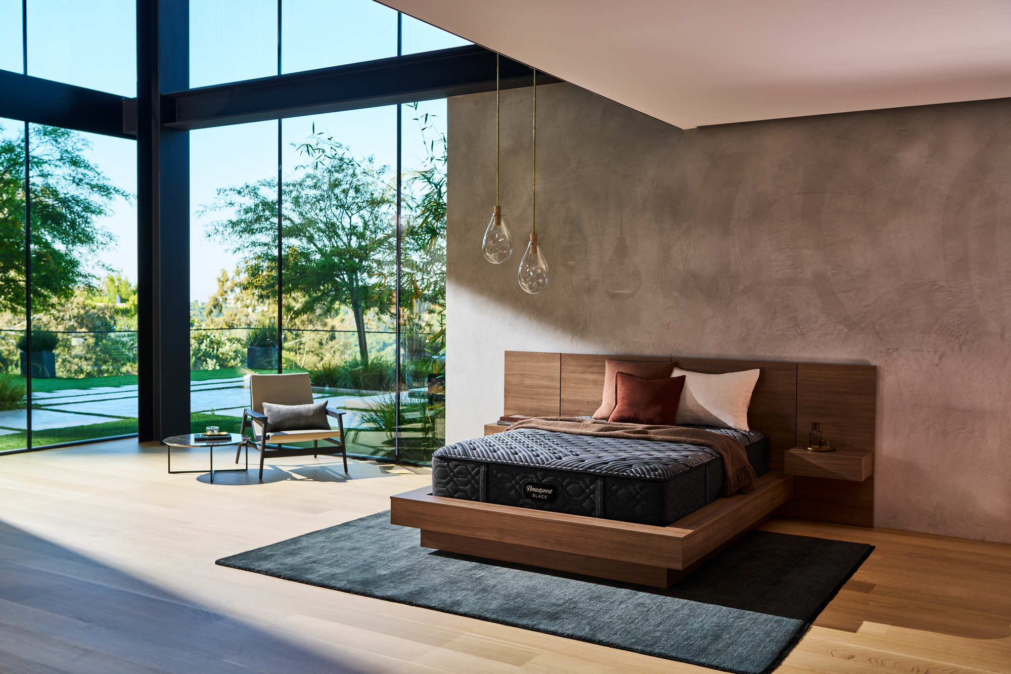 Modern bedroom with wooden bed and large glass windows