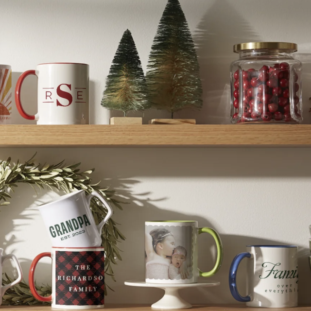Shelf with mugs, Christmas trees, jars, and bowls