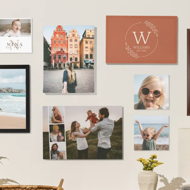 Family photos and artwork displayed on wall