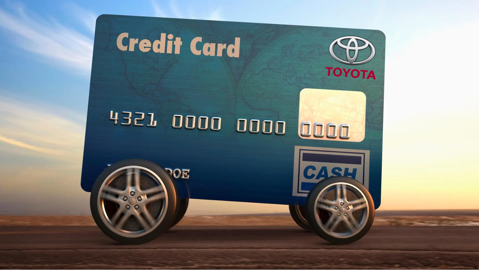 Credit card with wheels driving on road