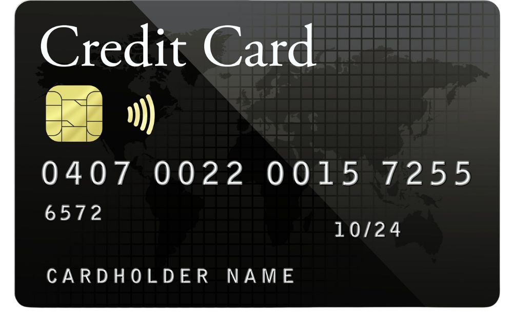 Black credit card with chip and world map background