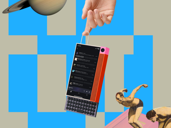 Hand holding colorful music player with planet and divers