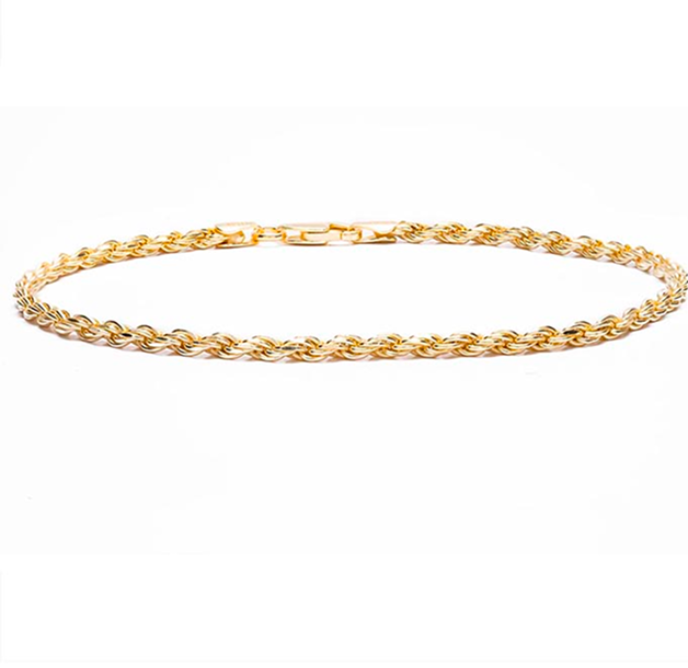 Delicate gold chain necklace on white background
