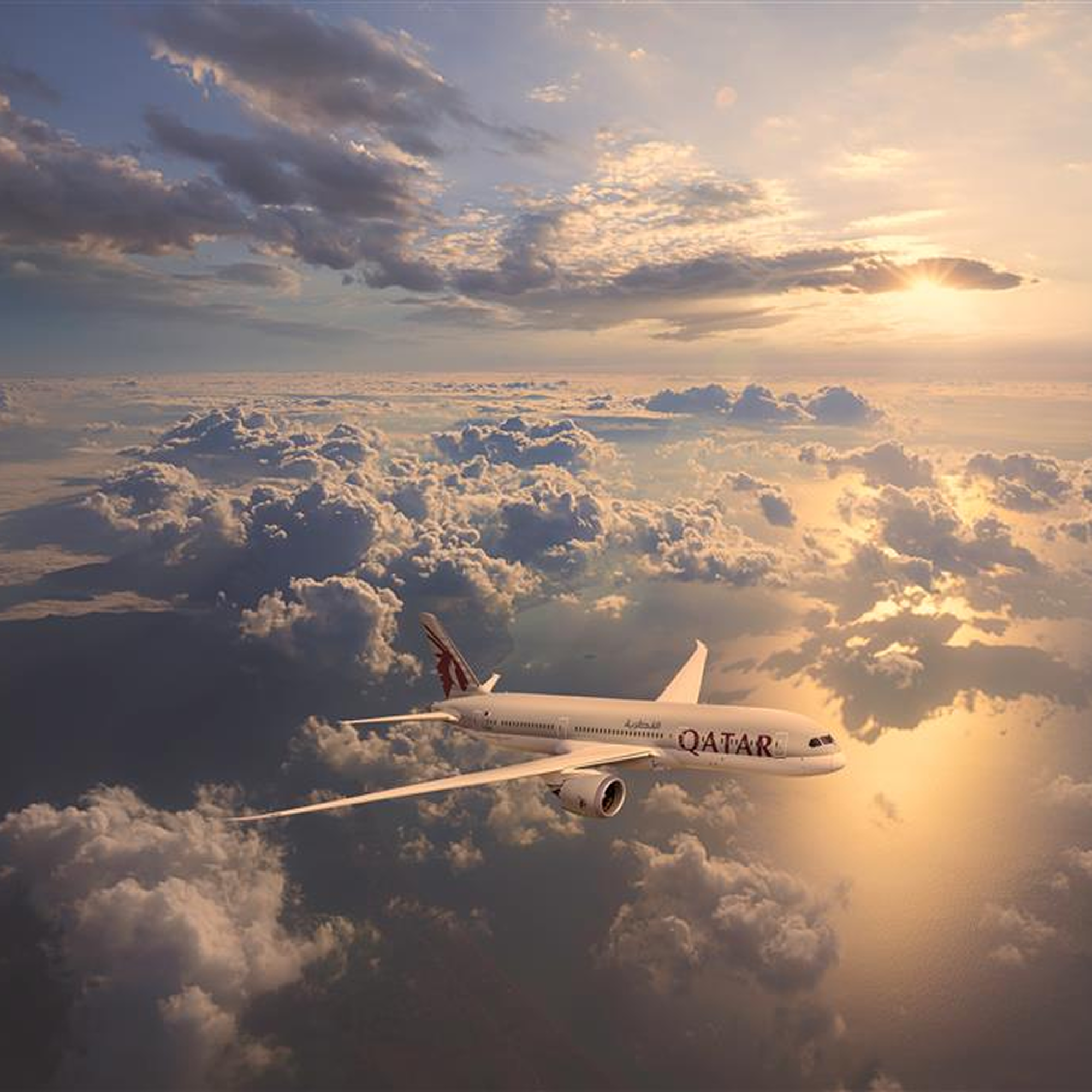 A Qatar Airways plane flying above clouds during a sunset with the sky lit in warm golden tones.