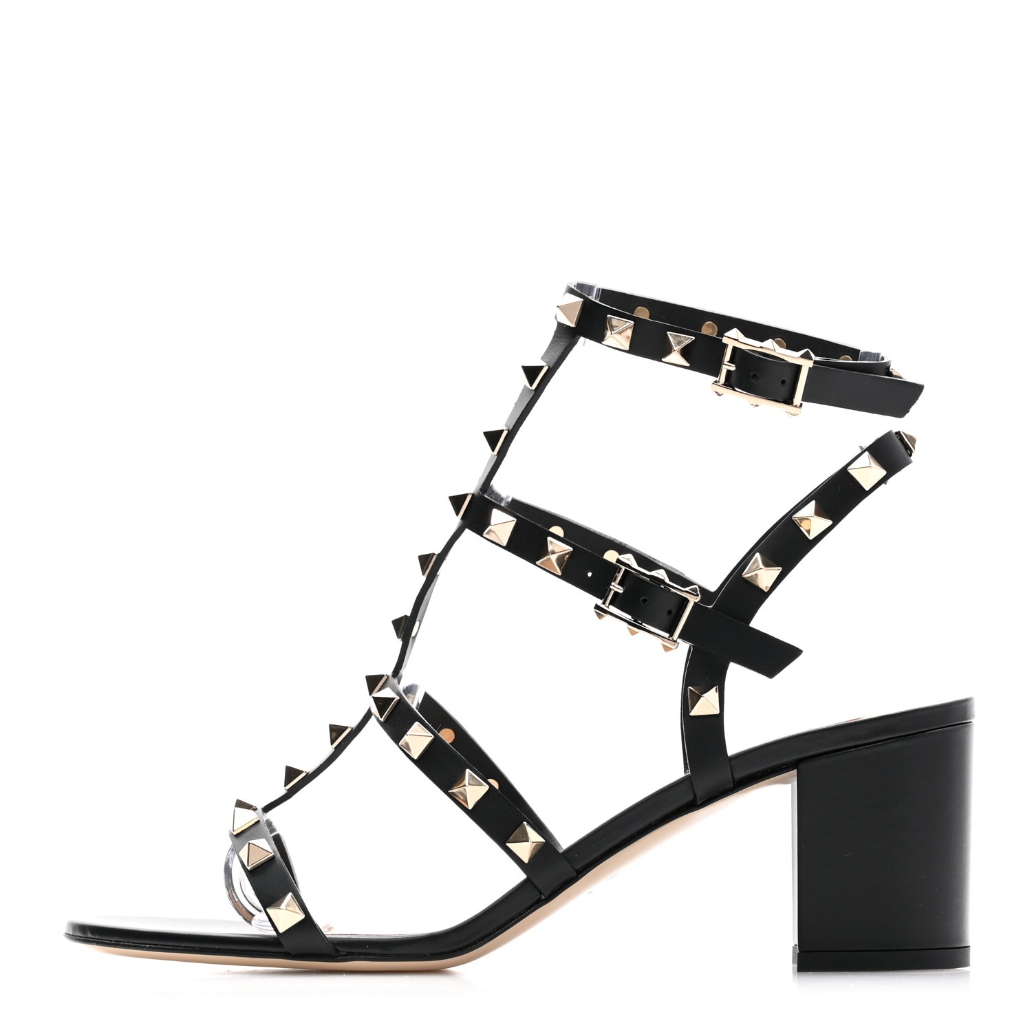 Black high-heeled sandal with multiple straps adorned with silver pyramid studs and two adjustable buckle closures, featuring a block heel and open toe design.