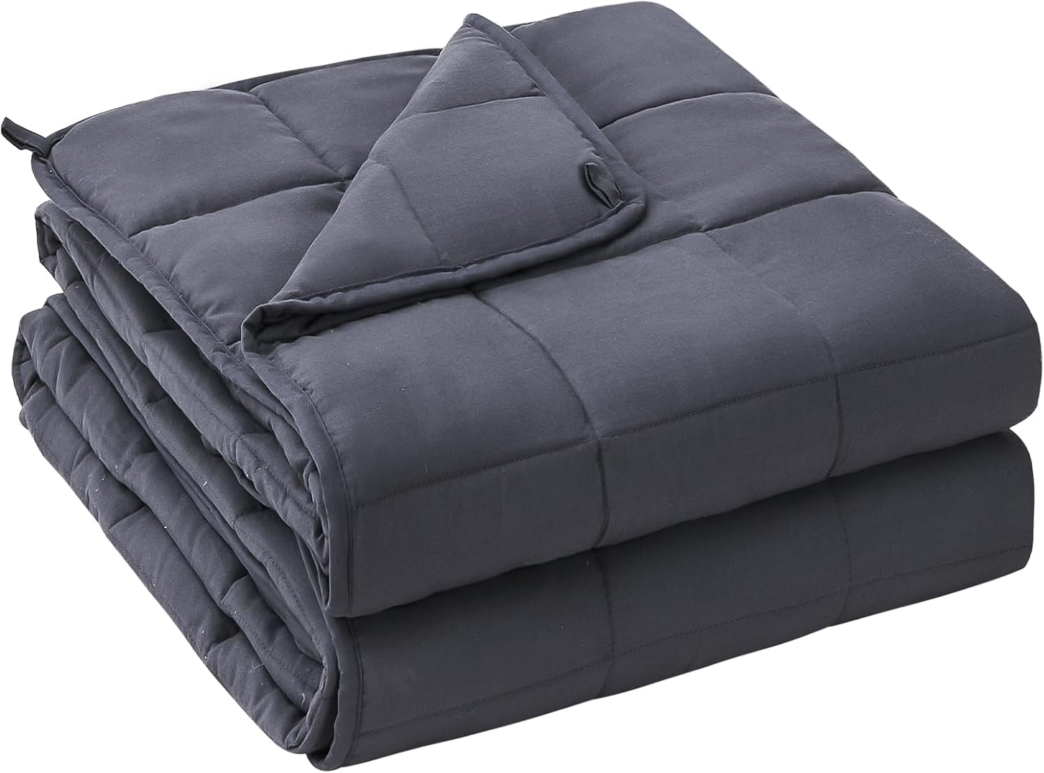 Folded dark grey weighted blanket with quilted square pattern and a corner slightly turned over