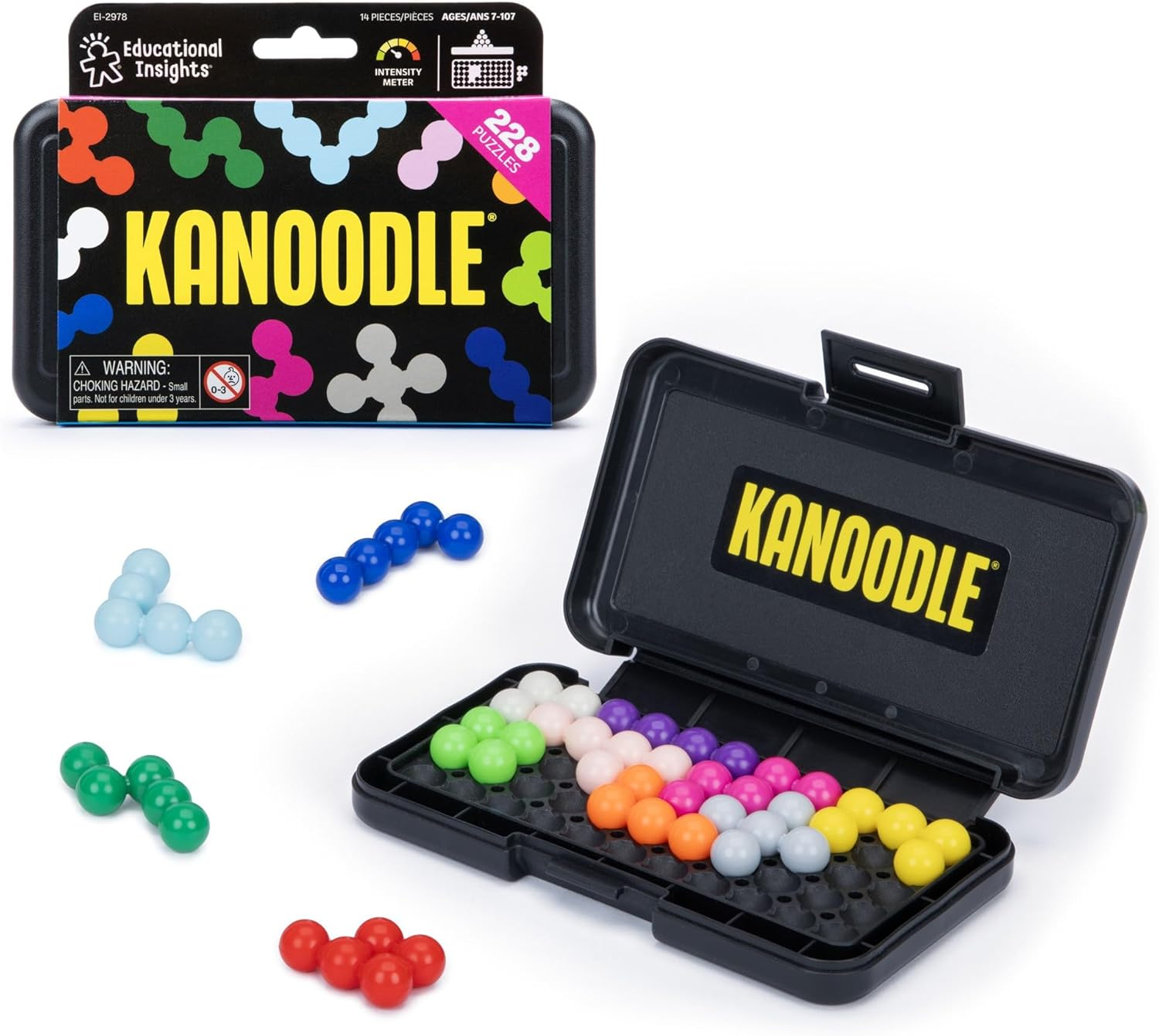 Kanoodle puzzle game featuring a black plastic case with colorful interconnected ball pieces arranged inside and five separate colored puzzle pieces outside the case, along with the product packaging displaying the Kanoodle logo and branding.