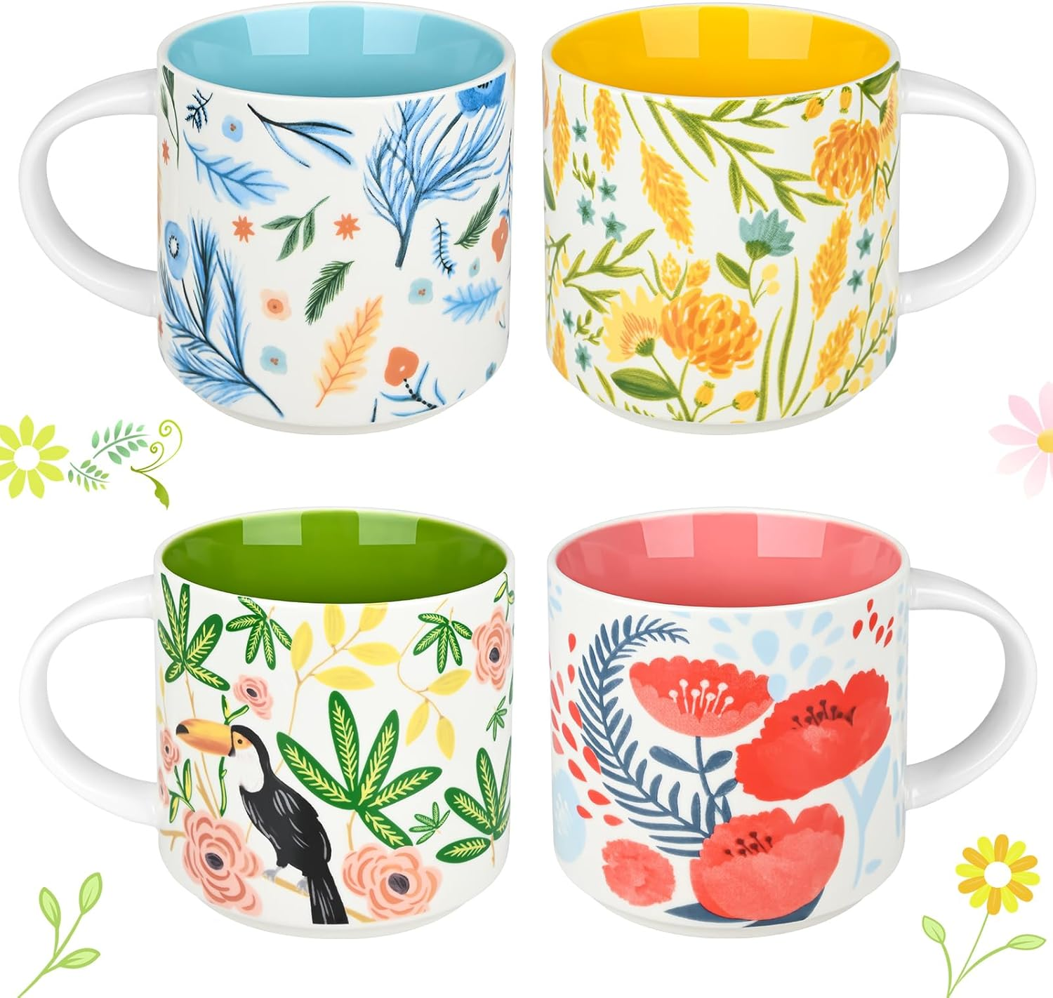 Set of four ceramic mugs with white bases, each featuring a unique floral or nature-inspired design and a different solid colour interior: one with blue leaves and blue interior, one with yellow-orange flowers and yellow interior, one with green leaves and a toucan illustration with green interior, and one with red flowers and pink interior, arranged in a two-by-two grid.