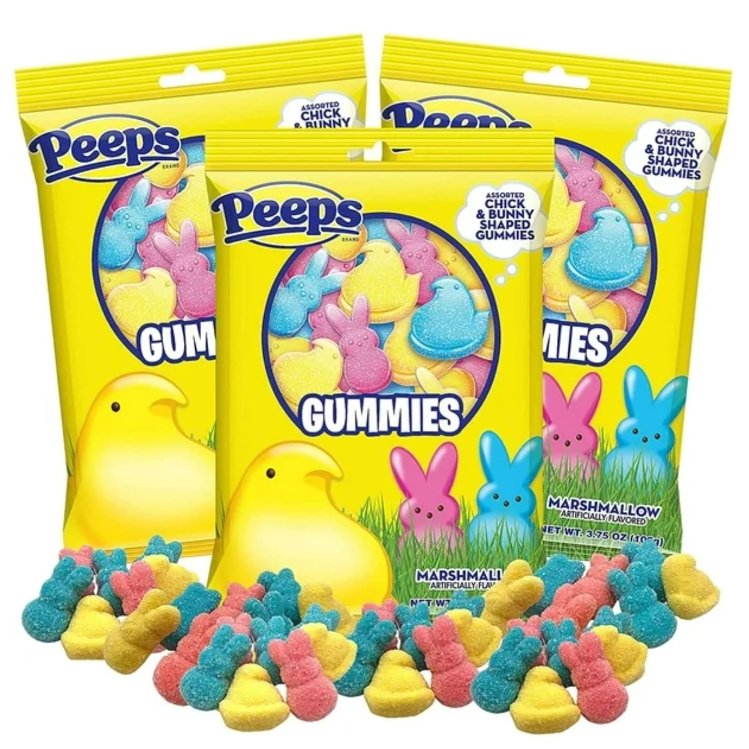 Three yellow bags of Peeps brand assorted chick and bunny shaped marshmallow gummies with pink, blue, and yellow gummy candies shaped like chicks and bunnies scattered in front of the bags.