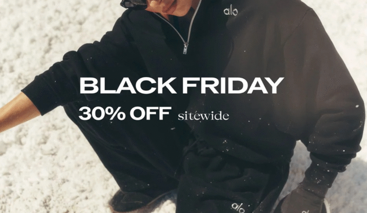 Person wearing black Alo branded activewear and sunglasses crouching on snow, with text overlay advertising Black Friday 30% off sitewide sale for a limited time.
