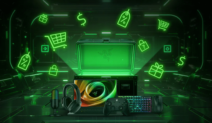 A futuristic dark room illuminated with green neon light showing a gaming laptop, headset, microphone, gaming controller, RGB keyboard, and mouse in front of an open trunk glowing green with the Razer logo, surrounded by icons of shopping carts, price tags, gift boxes, and dollar signs.